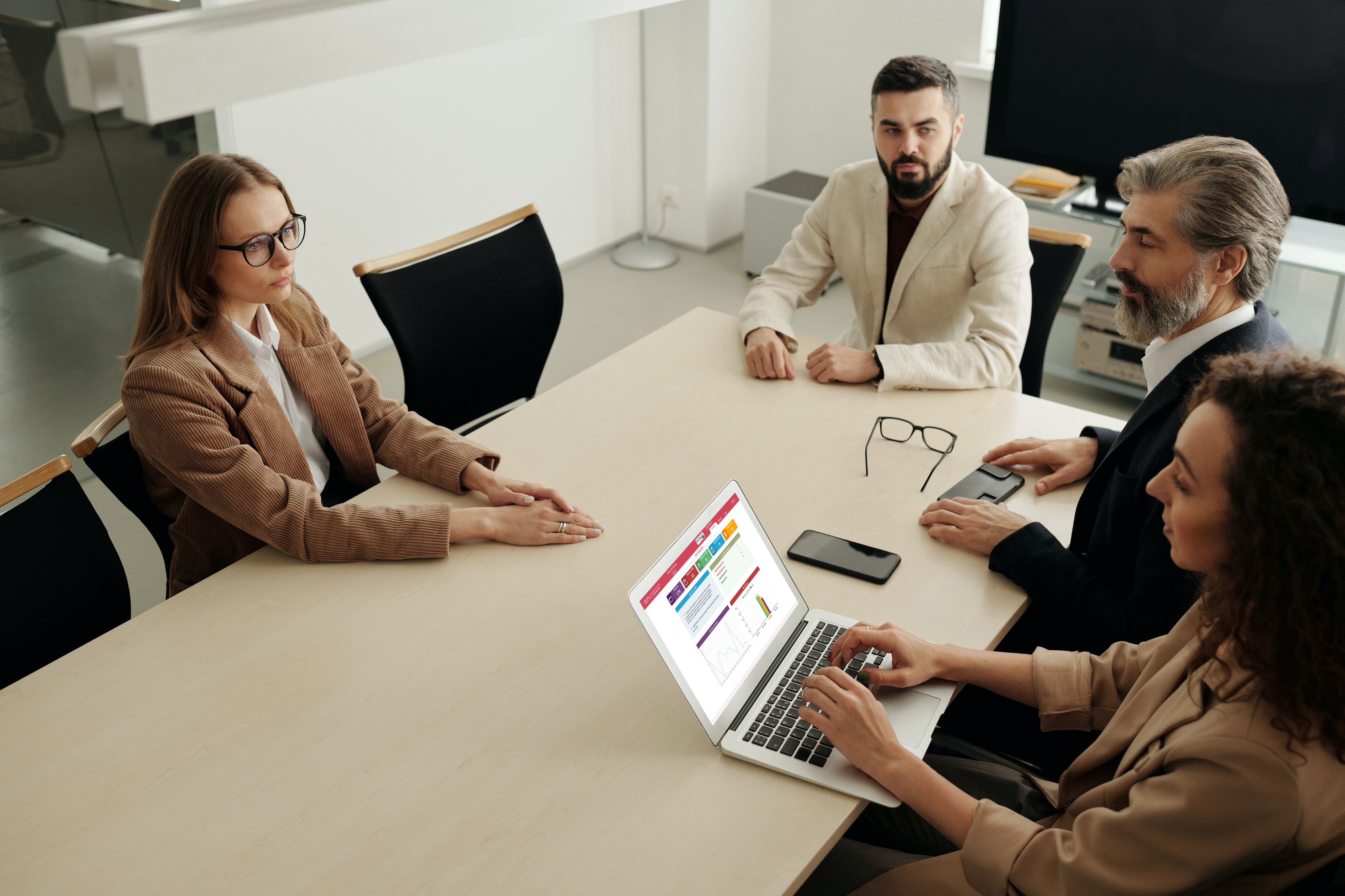 Woman using MacBook Air during the meeting_Screenshot 2023-02-16 113448 https://1040taxbiz.com/wp-content/uploads/2024/12/Woman-using-MacBook-Air-during-the-meeting_Screenshot-2023-02-16-113448.png